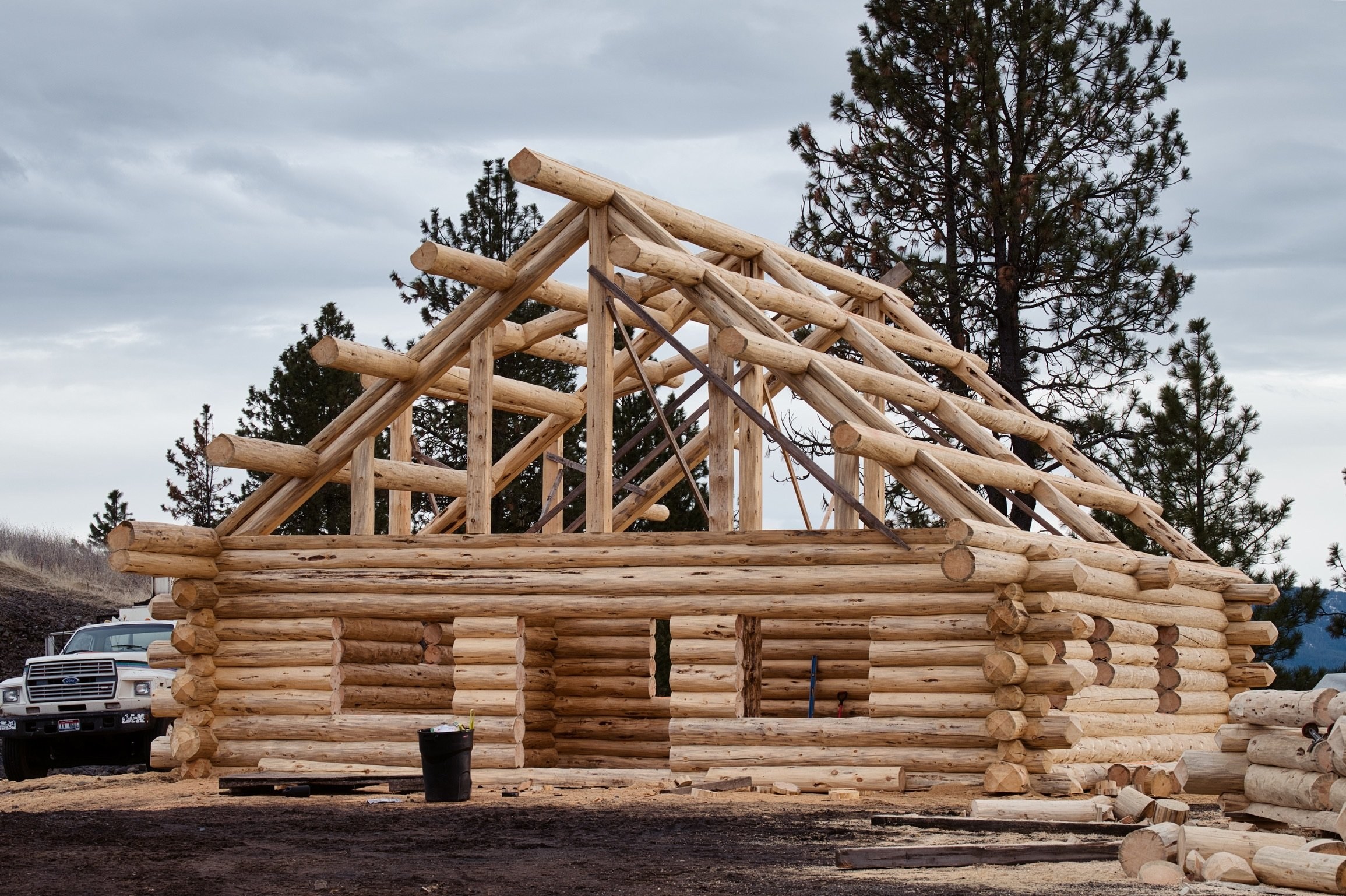 Riehl — illustrative photo (log cabin timber frame)