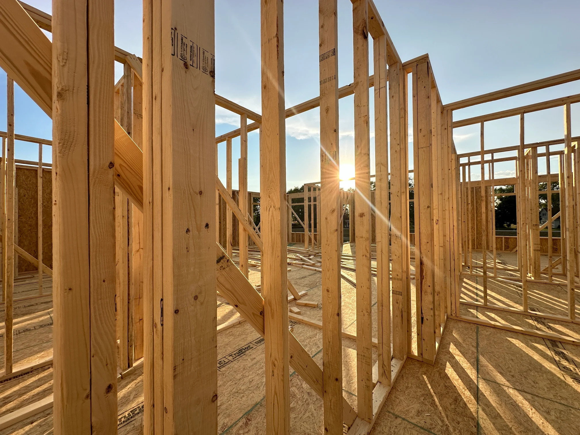 Illustrative house framing under construction